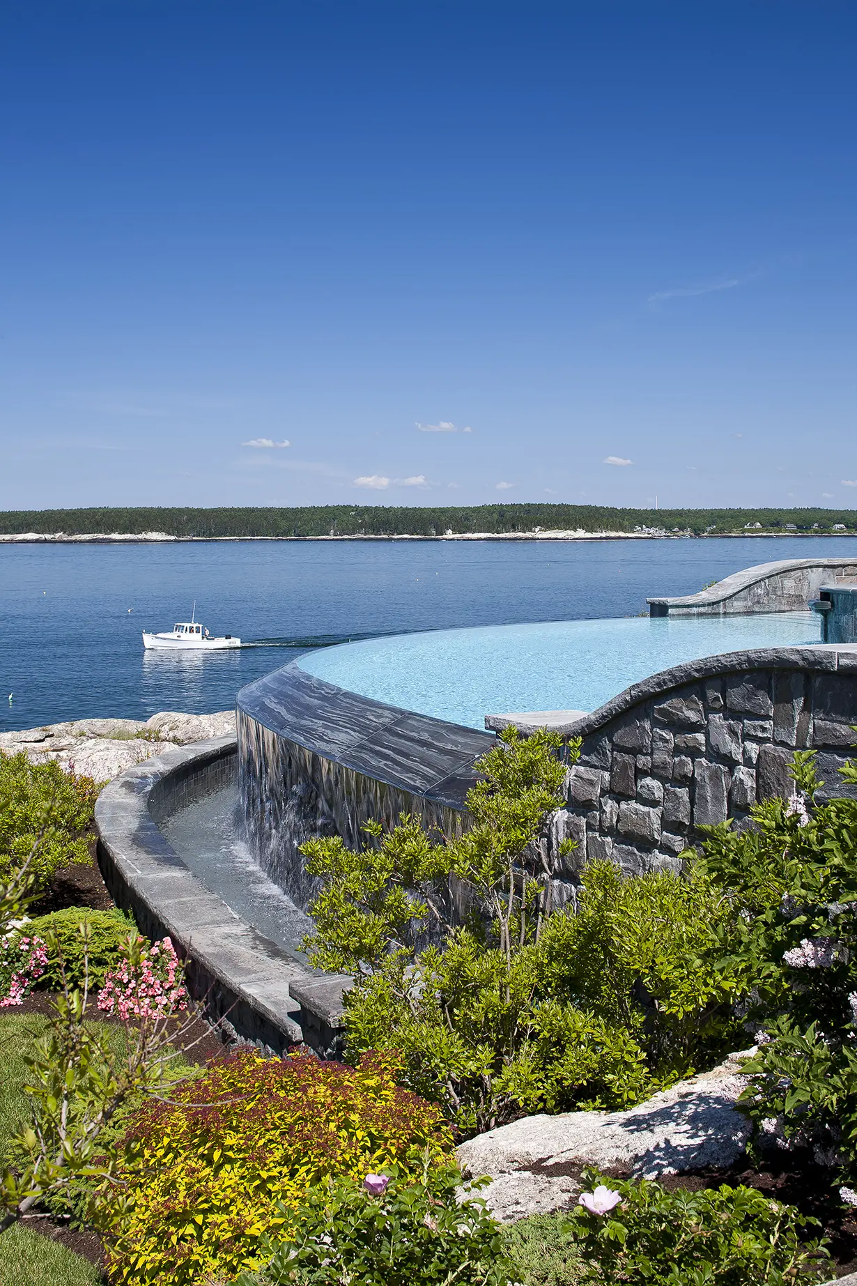 View of pool overlooking coast