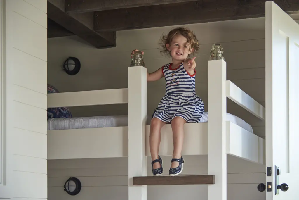 Child enjoying the new bunk beds at the bunkhouse at Basque in the Sun
