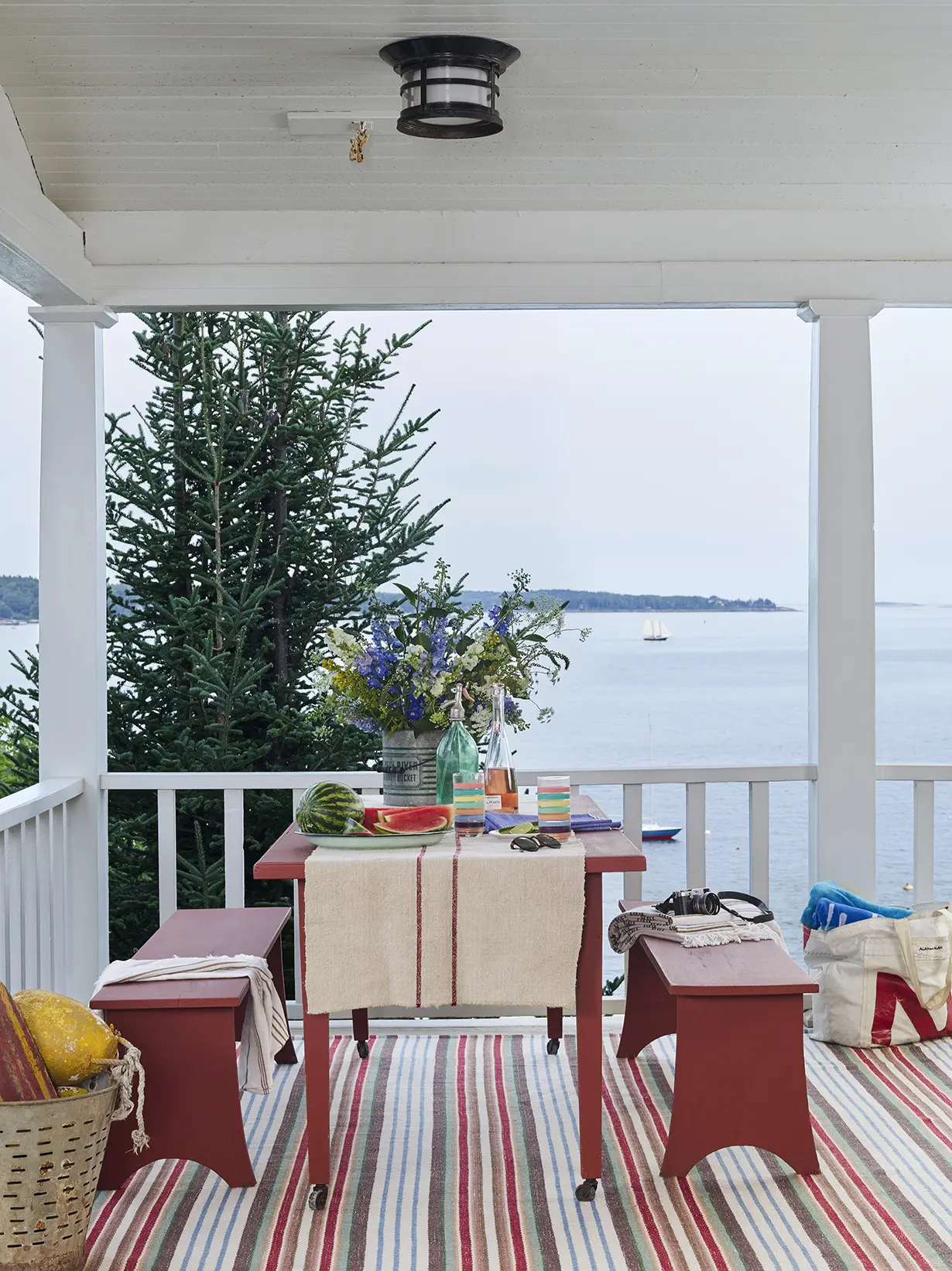 Outdoor dining with a water view at Basque in the Sun