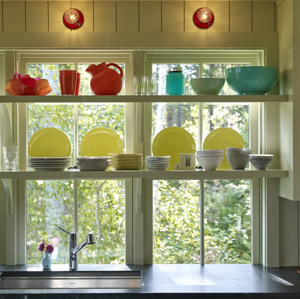Window shelving with colorful dishes at Capitol Island
