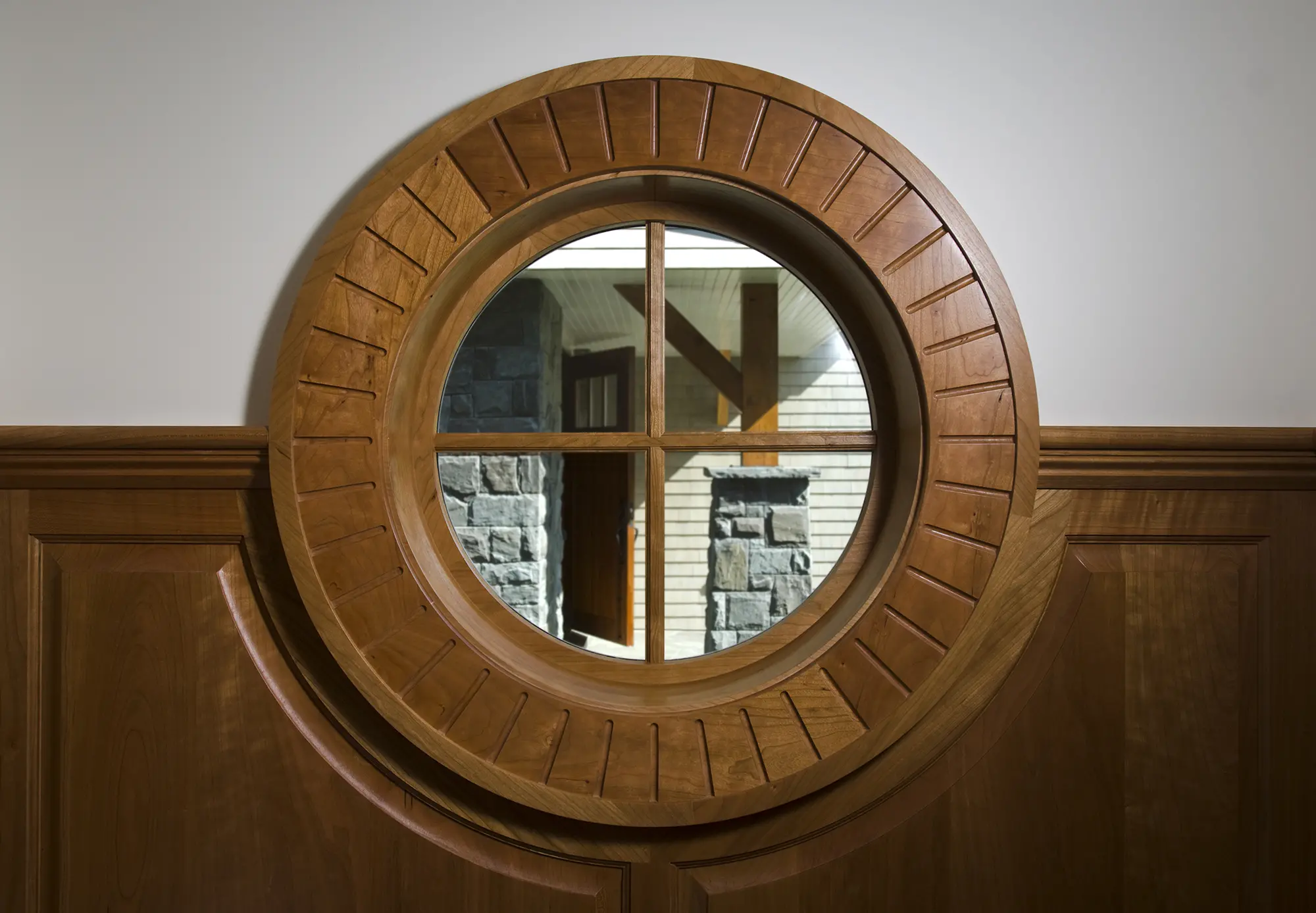 Custom carved window with few of front door