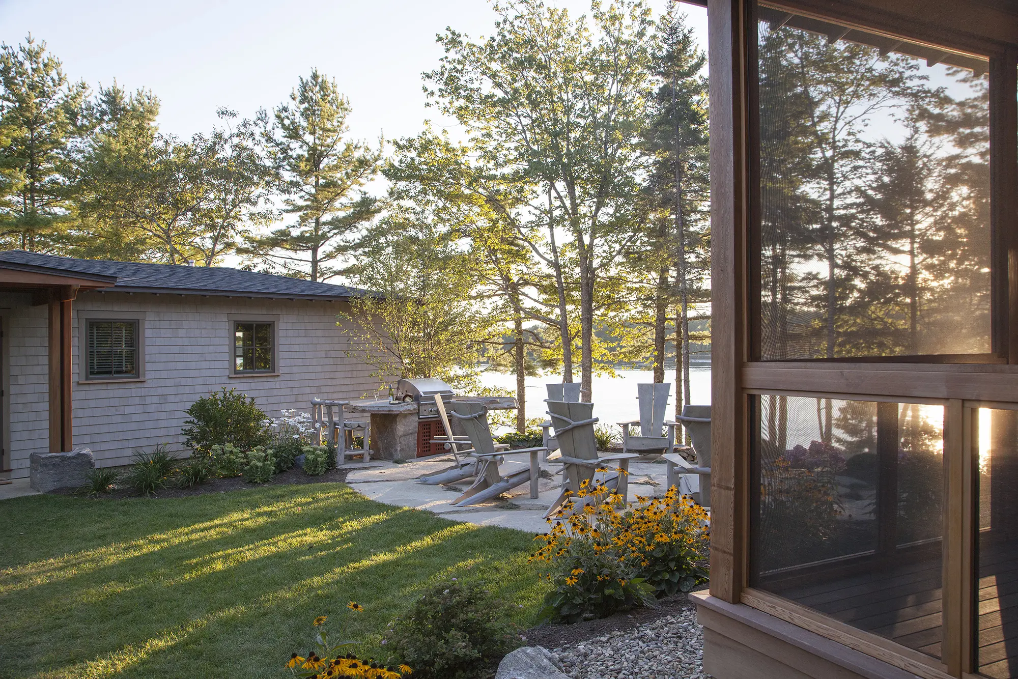 View of the patio between the Cross Point Cottages looking towards the water