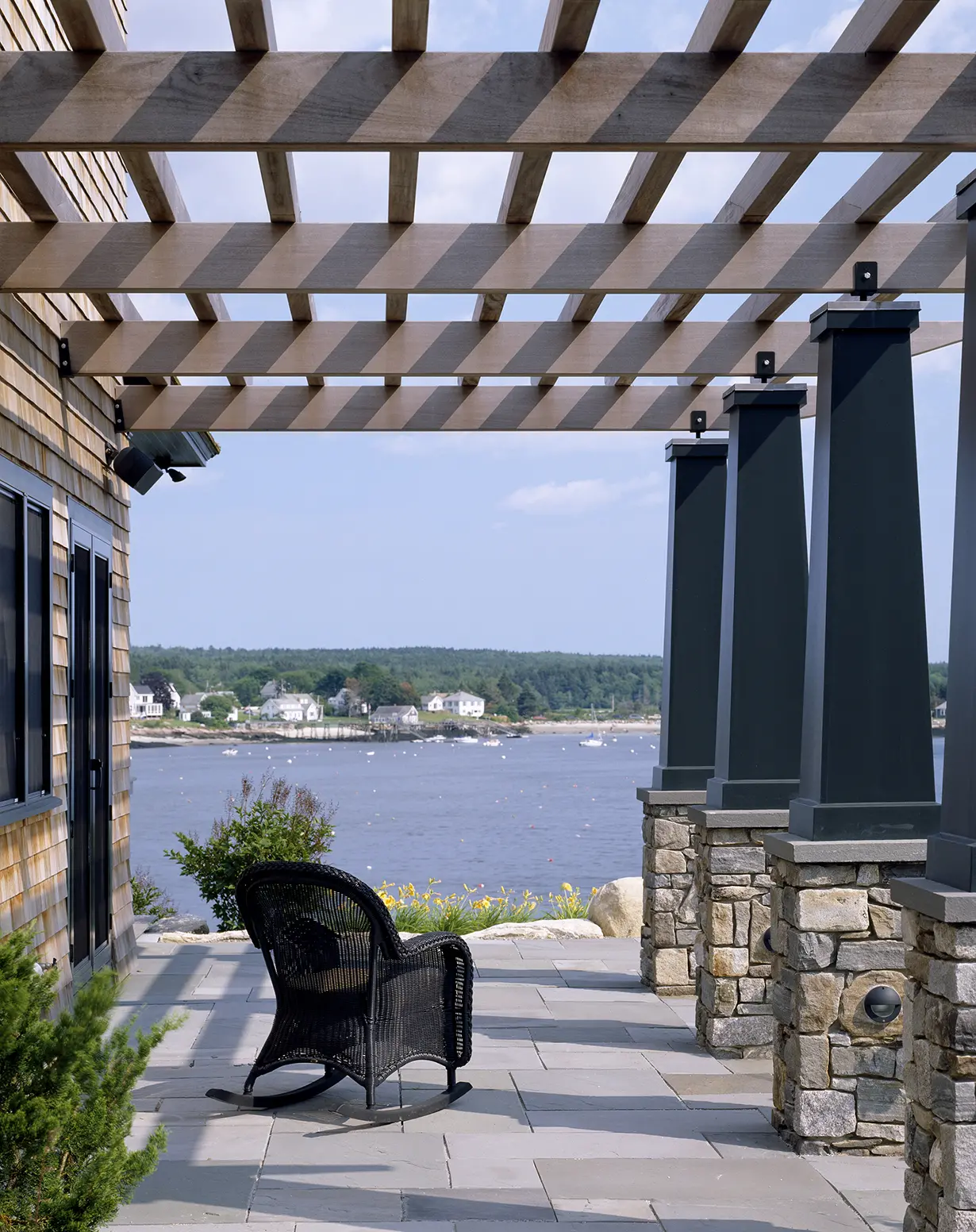 Terrace and stone patio with waterfront views at the Barbican project