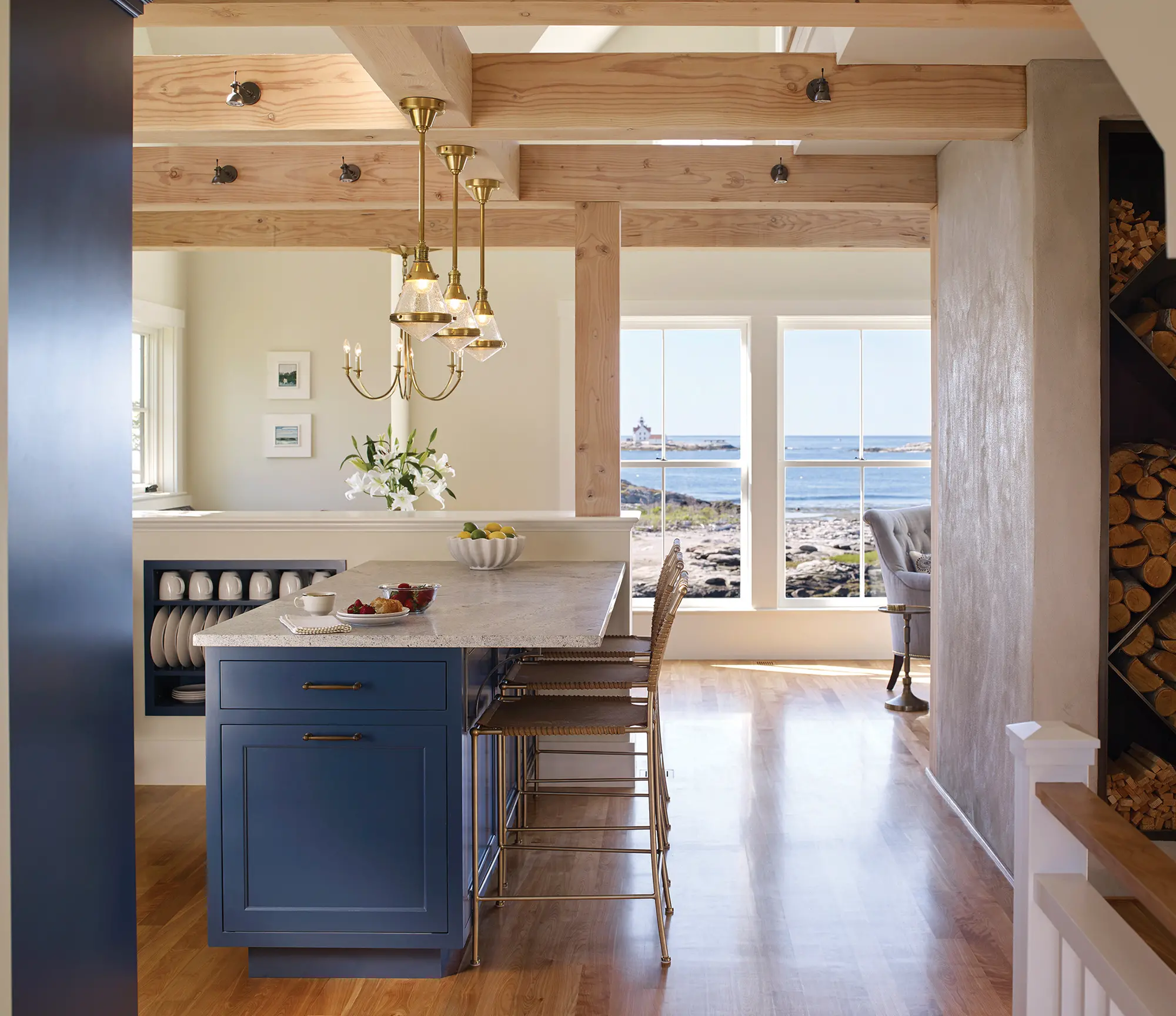 View of kitchen with exposed beams and view of ocean