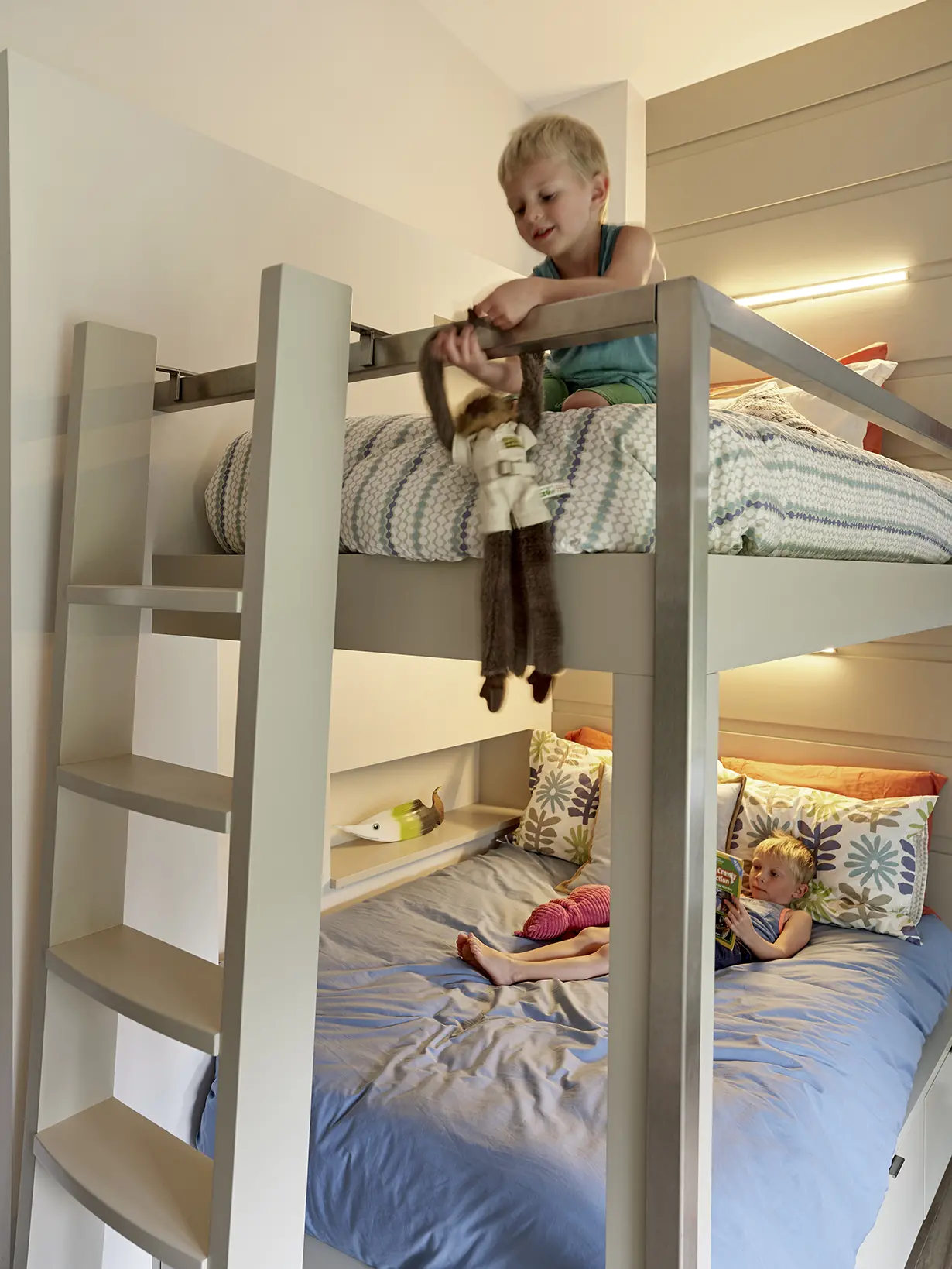 Built in bunkbeds and wood paneling walls