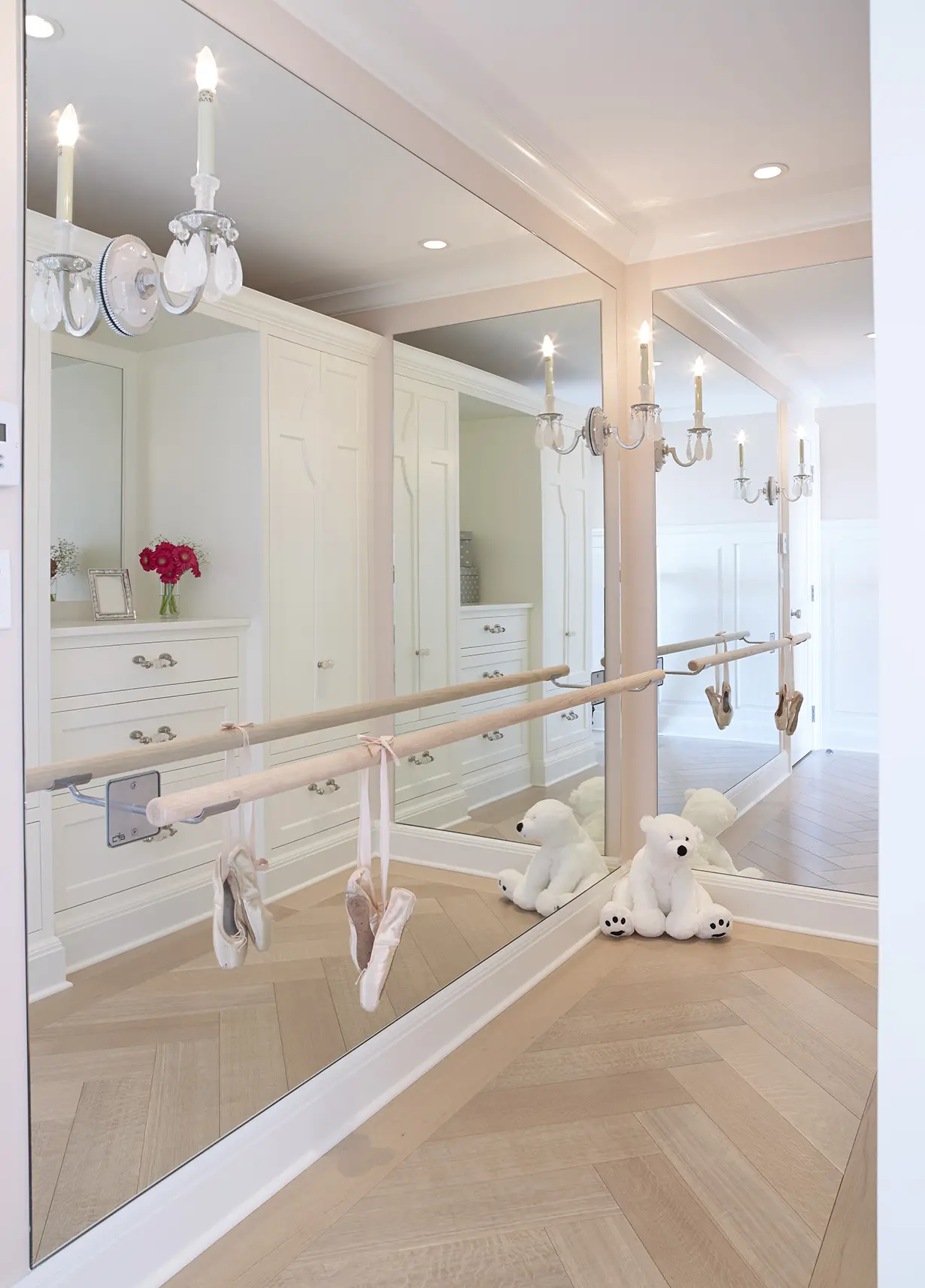 Custom ballet room and flooring with sconces