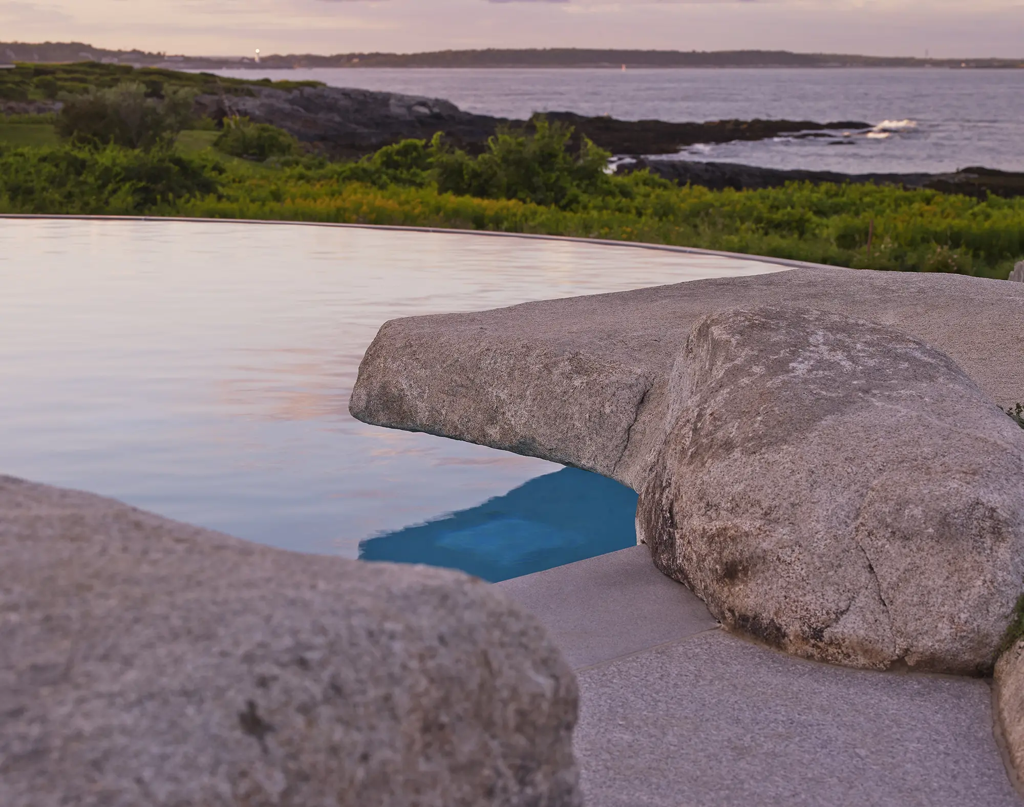 Pool at Whales Watch with stone to make seemless views throughout coastline