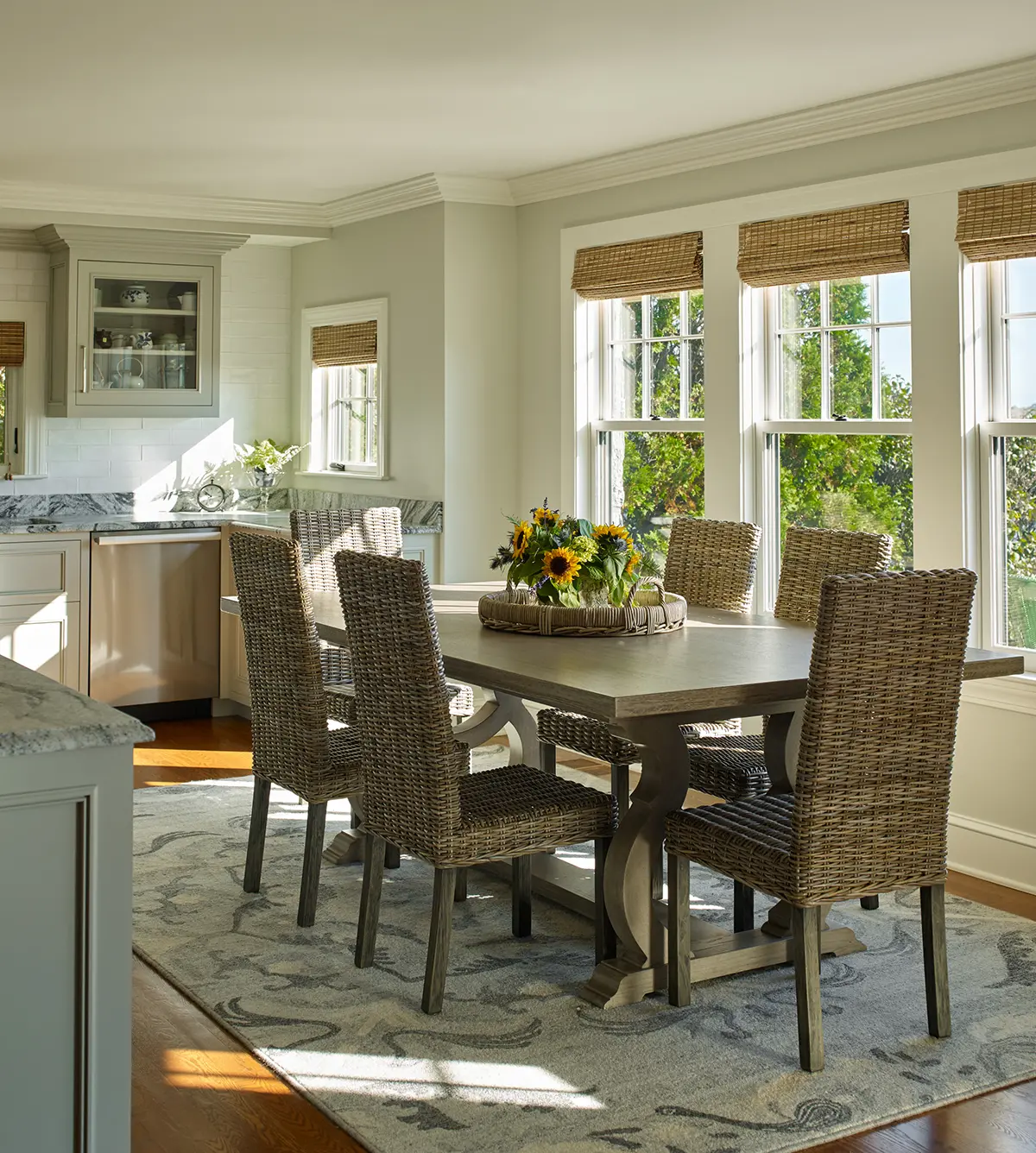 Dining area with large table and ocean views.