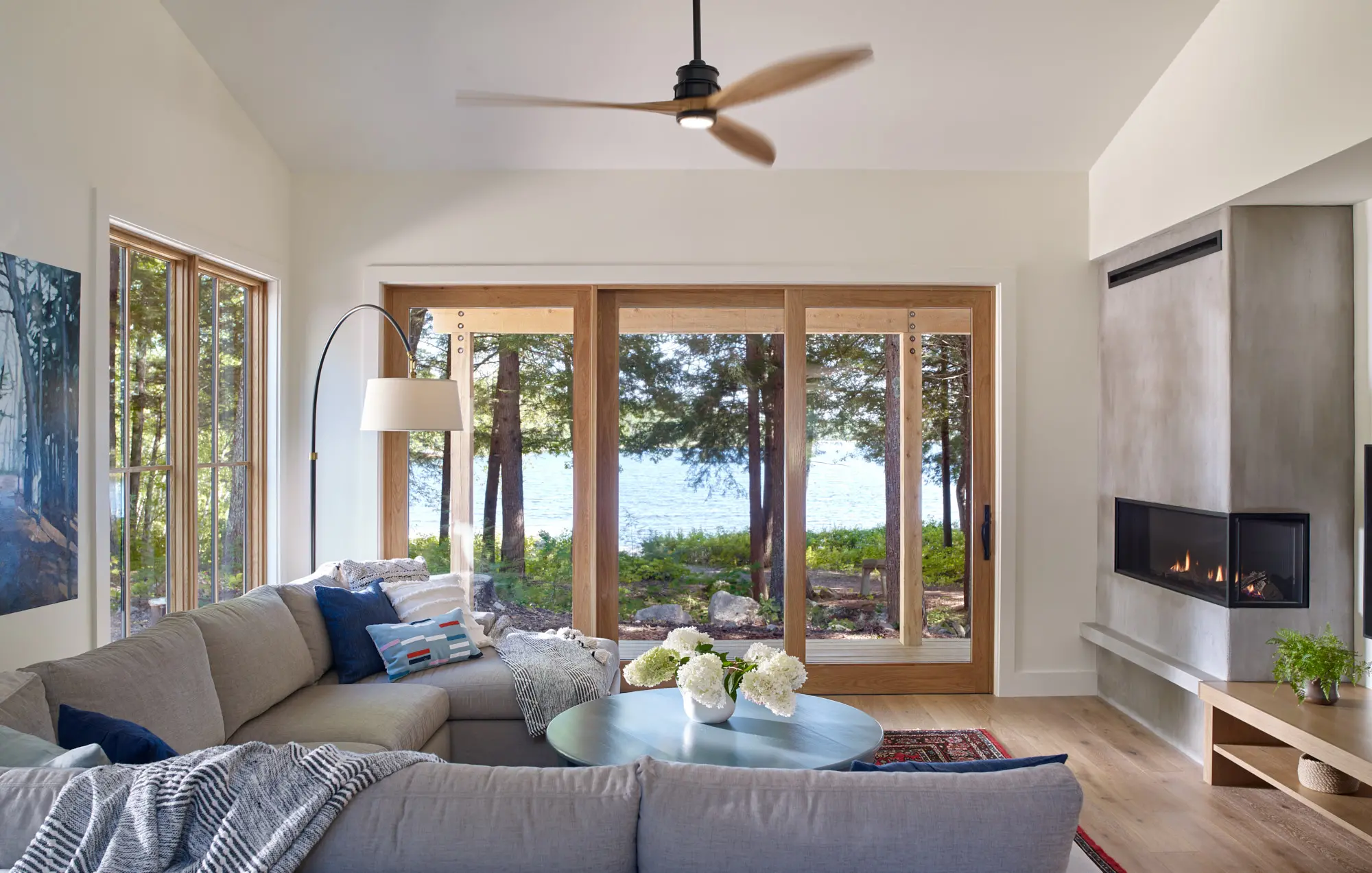 Modern living space with a view of lake at Cozy Bear Cabin