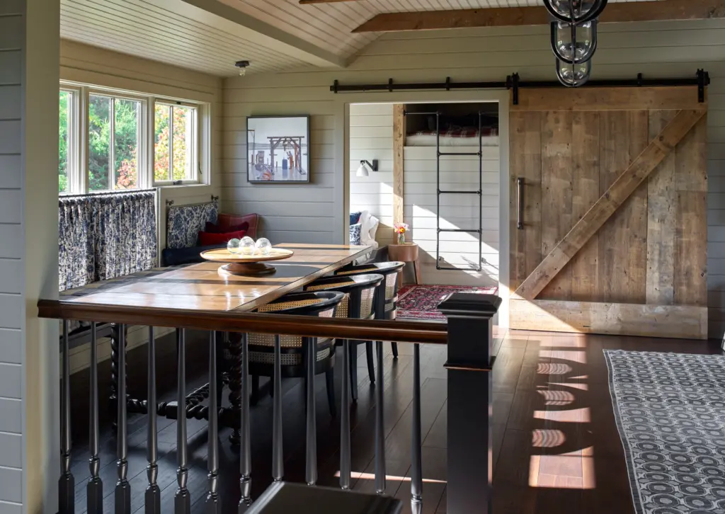 Kitchen area with rustic design and sliding barn door