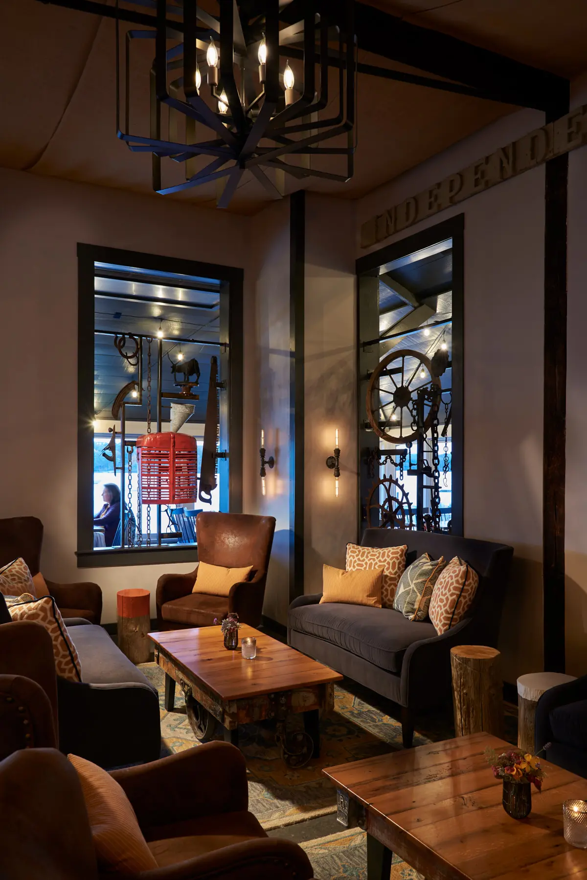 A view of the industrial rustic style of the lounge space at Water Street