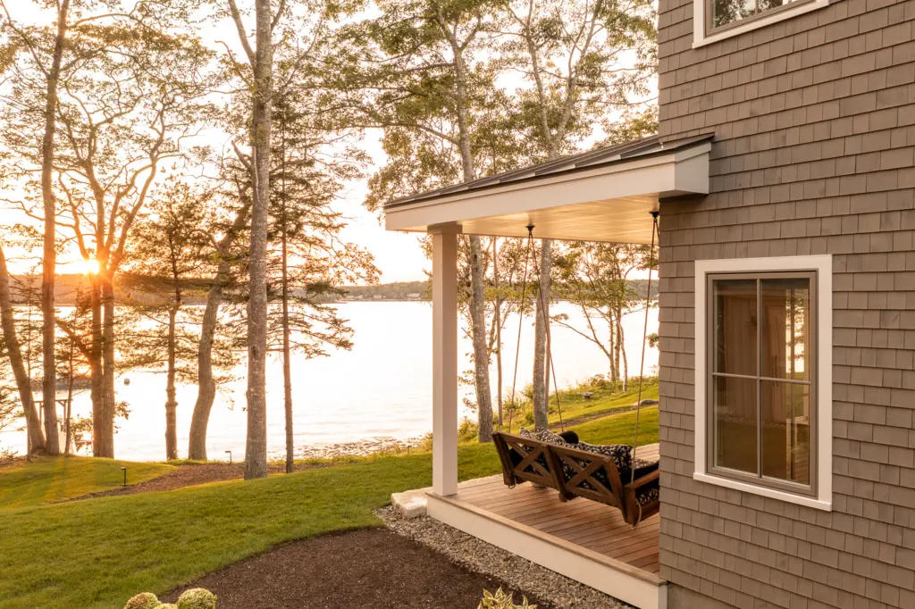 Porch swing with a view of coastal Maine