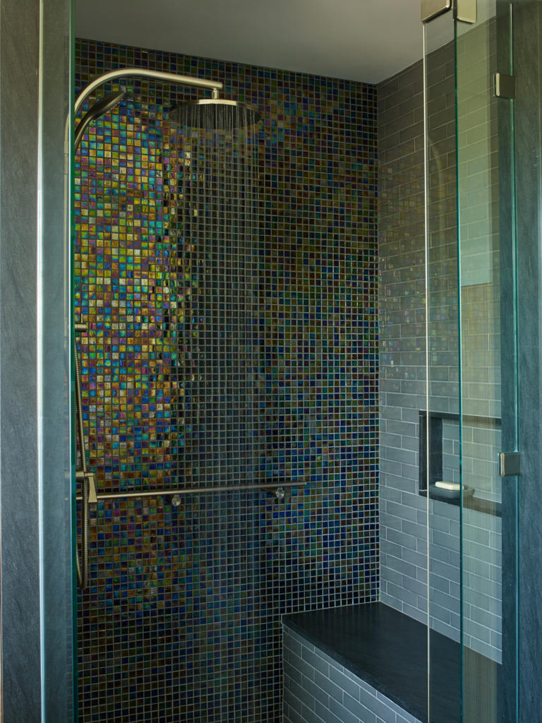 Colorful tiled walk in shower at Fish Point